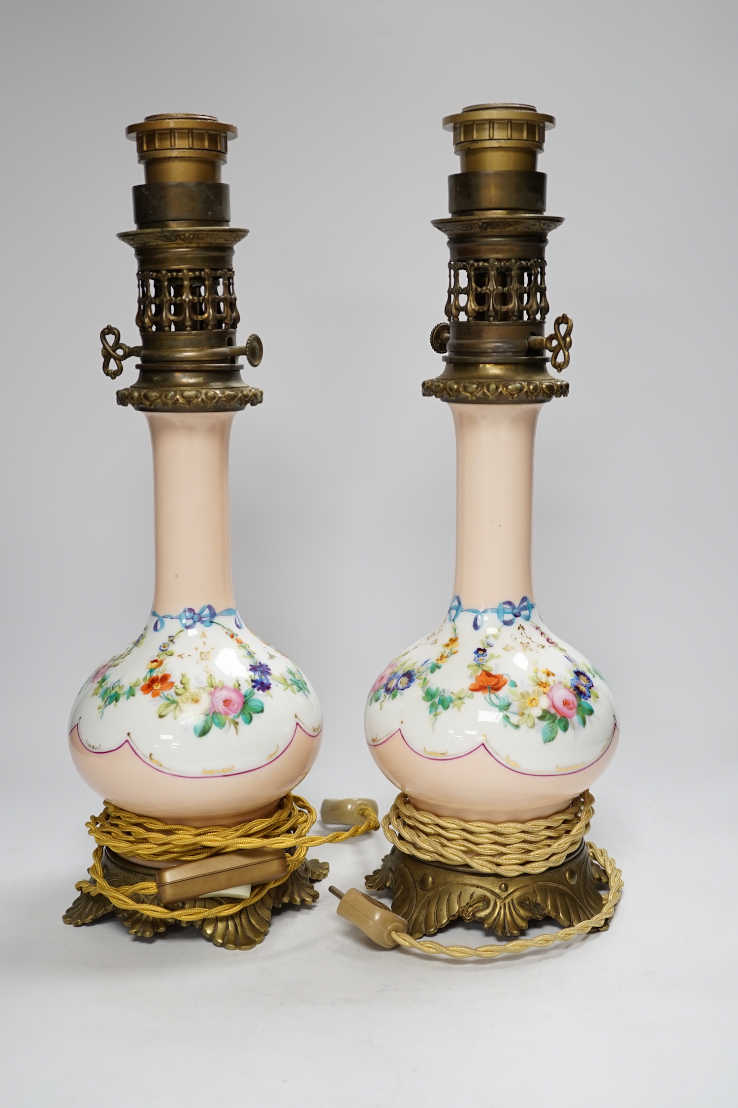 A pair of French brass mounted porcelain table lamps, 42cm